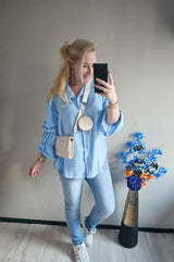BLOUSE RUFFLE MOUW | LICHT BLAUW