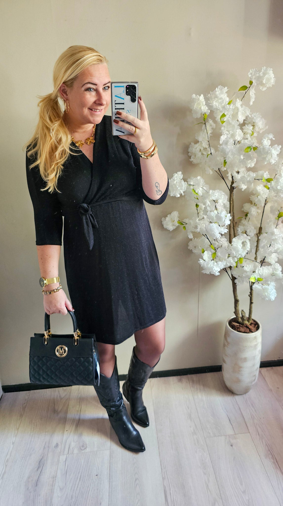 zwarte feestjurk met ceintuur